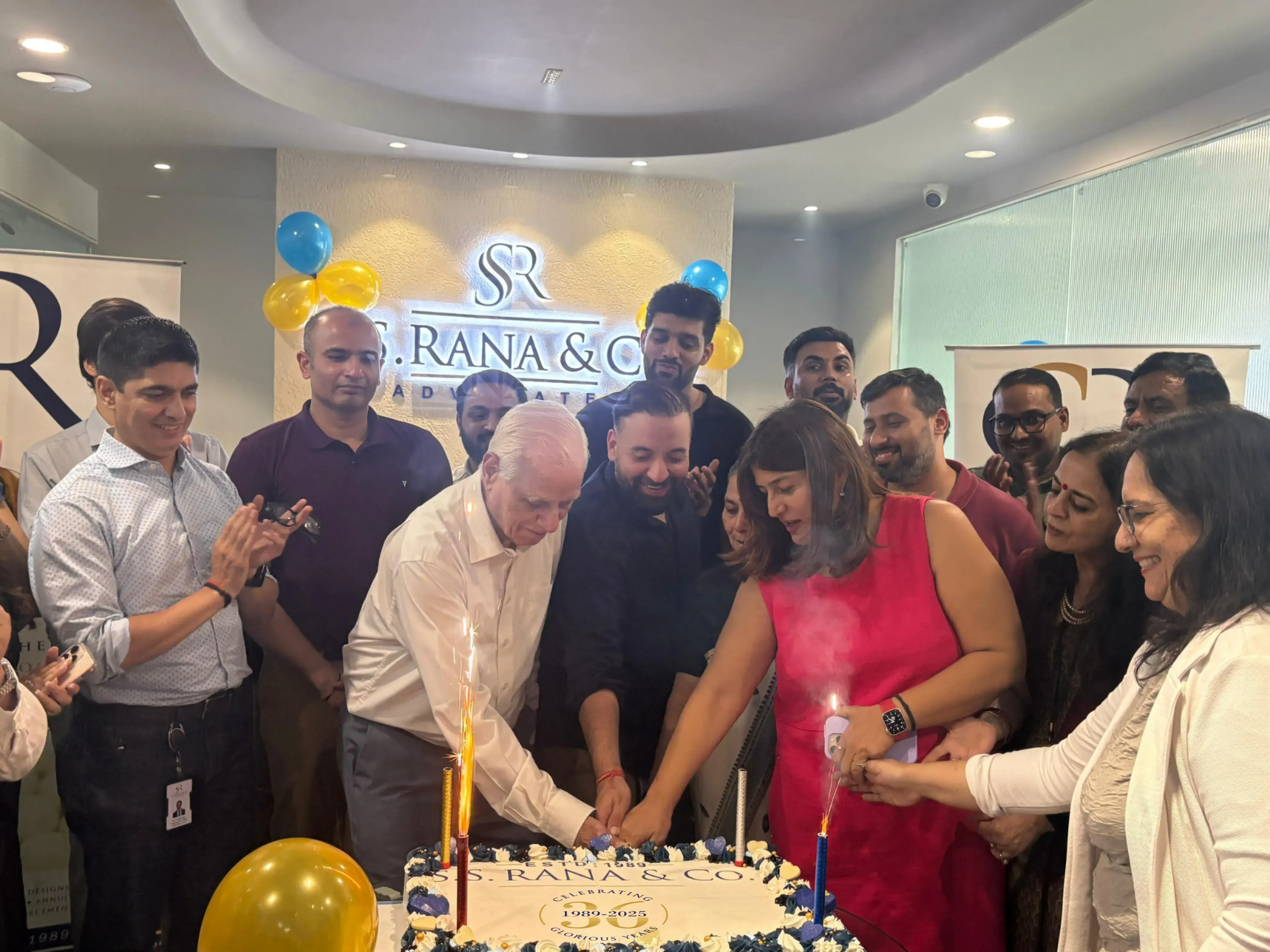 Sohan Rana, Lucy Rana and Nihit Nagpal Cutting Cake