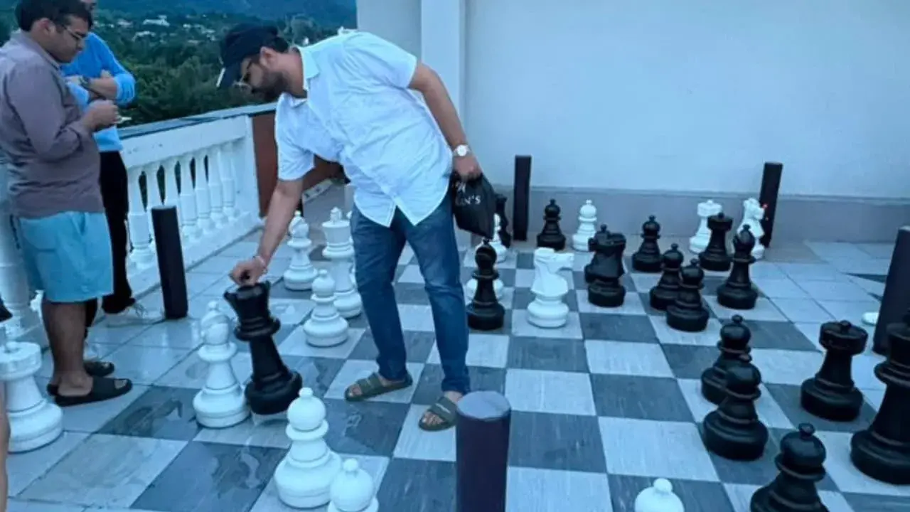 Employees Playing terrace Chess 2