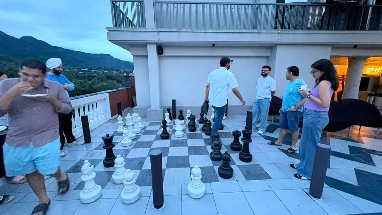 Employees Playing terrace Chess 4