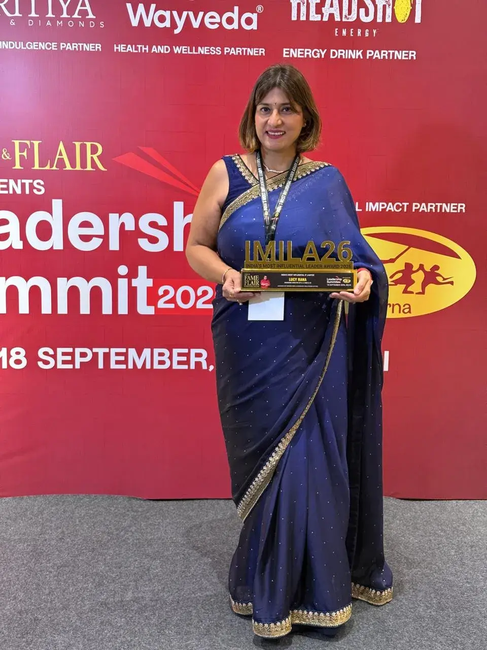 Lucy Rana with IMILA Award